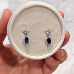 Our bridal drop earrings set with blue sapphires and diamonds are perfect for brides who want to add glamour and color to their bridal look in a subtle and elegant way. Available in 14k and 18k yellow rose and white gold, as well as platinum--just choose your desired metal from the drop-down menu! These earrings are fully customizable. Prefer different dimensions? Would you like to add ruby or emeralds or other colored gemstones in place of blue sapphires and diamonds? Contact us today for a no- Bridal Drop Earrings, Diamond Wedding Jewelry, Bridal Earrings Drop, Colored Gemstones, Diamond Bar, Yellow Rose, Eternity Bands, Earrings Set, Diamond Wedding