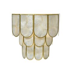 an art deco chandelier made out of mother of pearl