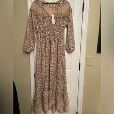 New Love Stitch Bohme Anthropologie Large Pink Brown Maxi Prairie Boho Dress $169 New With Tags. Fully Lined. Super Soft Material. Pet And Smoke Free Home! I Have Tons Of Cute Stuff Listed. I Will Bundle! Chest Measures Laying Flat Across From Armpit To Armpit 17” Length 58” Sold Out Online!! If You See Other Items Listed You Like, I Can Bundle! Just Click Add To Bundle On Every Item You Like And I Can Submit You One Offer For All And Ship All Together In One Package To Save You Shipping Cost. Long Sleeve Boho Print Dress For Brunch, Flowy Feminine Dress With Boho Print, Flowy Boho Print Feminine Dress, Feminine Boho Maxi Dress, Pink Long Sleeve Maxi Dress For Casual Wear, Cream Bohemian Maxi Dress For Casual Wear, Bohemian Long Sleeve Cream Midi Dress, Bohemian Beige Long Sleeve Midi Dress, Elegant Long Sleeve Boho Print Dress