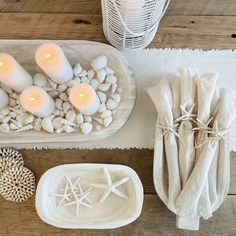 Our Whitewash Wood serving collection is hand carved from Paulownia wood. The bowl, tray and platter are all sold separately. Shown styled with white candles, natural shells and washed linens for a coastal tablescape. Coastal Fruit Bowl, Dough Bowl Nautical, Candles Fruit, Wood Platter, Beach Table, Beach House Interior Design, Paulownia Wood, Bleached Wood, Dough Bowls