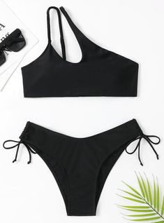 Go bold with this stunning black bikini, crafted to combine modern design with ultimate comfort. The top features a distinctive one-shoulder strap, offering a chic and contemporary look that sets you apart. This unique design provides a secure fit while adding a touch of sophistication to your beachwear. The high-cut bikini bottoms feature adjustable side ties, allowing for a personalized fit that highlights your curves beautifully. Made from premium, quick-drying fabric, this bikini ensures you Swimsuit Women, Suit Women, Womens Bathing Suits, Woman Beach, Swimwear Outfit, Swimwear Collection, Women Swimsuits, Two Pieces, Bathing Suit