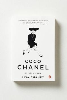 the book coco chanel an intimate life by person is displayed on a white surface