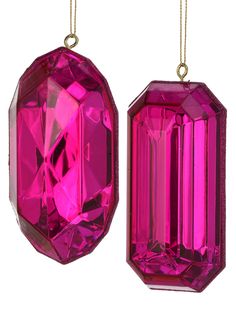 two pink glass ornaments hanging from gold chains