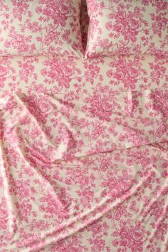 pink and white floral bedding with matching pillow shampoos on the bottom half