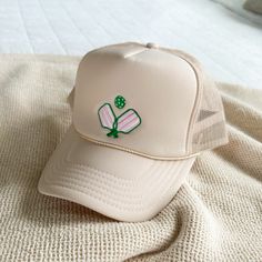 Cutest trucker hat for our girly girls! Snapback style. Embroidered with love at LMSS. Cute Trucker Hat With Flat Brim, Playful White Trucker Hat For Spring, Playful Mini Cap Hats For Spring, Playful Spring Mini Cap Hat, Playful White Baseball Cap For Spring, Trendy Cream Trucker Hat For Summer, Cream Trucker Hat With Curved Brim For Spring, Cream Curved Brim Trucker Hat For Spring, Playful Spring Trucker Hat With Curved Brim