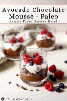 chocolate mousse - paleo dessert with berries and whipped cream