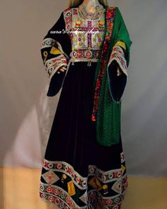 afghan kuchi traditional wedding drees is made of good quality long lasting fabric. Traditionally such Afghanistan Persian Pashtun new design frocks are used as bridal dress. Most of girls also like and recommend such dresses for wedding, Nikkah and Mehndi night events. The dress measurements are kept average. If you need this frock in exact measurements you need, then please send us measurements which best fit on your body Bohemian Embroidered Ceremonial Gown, Bohemian Gown With Zari Work, Ceremonial Bohemian Traditional Wear With Dabka Detailing, Long Traditional Wear With Mirror Work, Bohemian Long Dupatta With Dabka Work, Traditional Long Wear With Mirror Work, Traditional Long Lehenga With Mirror Work, Bohemian Style Ceremonial Dupatta With Dabka, Bohemian Dabka Work Dupatta For Ceremonial Use