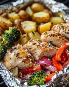 chicken, broccoli and red peppers in foil packets