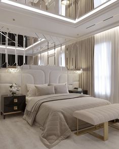 a large white bed sitting in a bedroom next to a tall mirror above it's headboard