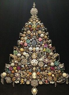 a christmas tree made out of buttons and other items