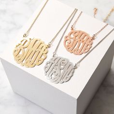 Personalize the Sterling Silver Monogram Necklace with your three initials for a custom necklace you can wear everyday! Each sterling silver monogrammed necklace is custom made  with your initials in a beautiful scripted monogram style. Create a classic monogram sterling silver necklace by placing your initials in this order: first name initial on the left side  last name initial enlarged in the center  and the middle initial on the right. When using our online customization tool  write your ini Gold Monogram Necklace, Monogram Necklace Gold, Nameplate Necklace Silver, Coordinates Jewelry, Silver Monogram, Classic Monogram, Nameplate Necklace, Monogram Jewelry, Gold Monogram