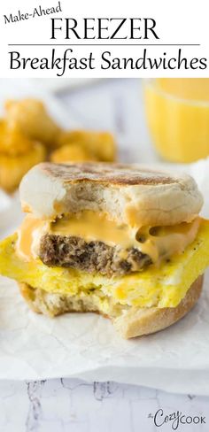 a breakfast sandwich with eggs, cheese and sausage