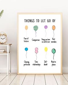 a poster with the words things to let go of on it next to a clock