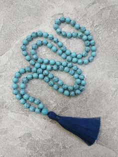 Turquoise Mala Necklace Turquoise Howlite 108 Mala Hand Knotted Mala Necklace Blue Tassel Mala Bead Yoga Gift Jewelry Prayer Beads Necklace  -  8mm  Turquoise Howlite 108 beads -  10 mm Howlite Guru bead -  9cm Blue tassel MY SHOP: https://www.etsy.com/shop/BonBonStones Please contact me with any questions. I'm happy to help! Blue 8mm Bead Jewelry For The Beach, Beach Jewelry With 8mm Blue Beads, Blue Beaded Jewelry For The Beach, Blue Beaded Jewelry For Beach, Blue Hand-strung Bohemian Beaded Necklaces, Bohemian Blue Hand-strung Beaded Necklaces, Turquoise Jewelry With 8mm Beads For The Beach, Blue Spiritual Beads With Colorful Details, Turquoise Round Beads Necklace For Beach