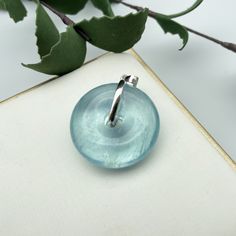 "Aquamarine Gemstone Pendant ,Donuts Aquamarine ,Silver 925 Pendant ,Gift, Cord necklace Pendant Size: 30 x 9mm Beads: 15mm Legend, Aquamarine is produced at the bottom of the sea, is the essence of the sea water, so sailors use it to pray for the sea god bless navigation safety, called it \"blessing god stone\". and is the birthstone for March. natural stone may have inclusions, natural lines or indentations.This is normal and part of the natural material." Aquamarine Beaded Jewelry For Gifts, Aquamarine Round Pendant Jewelry For Gift, Clear Round Beads Jewelry Gift, Clear Round Beads Jewelry For Gifts, Sterling Silver Rondelle Jewelry As A Gift, Aquamarine Round Pendant Gemstone Jewelry, Aquamarine Pendant Jewelry For Gifts, Aquamarine Pendant Jewelry As A Gift, Handmade Aquamarine Round Jewelry