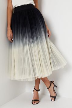 Striking ombre mesh design with a gradient from black to ivory
Pleated midi silhouette with a flattering A-line shape
Lightweight mesh fabric allows for effortless movement
Fully lined for a smooth, polished finish
Concealed back zip closure for a sleek look
Exude sophistication and elegance in this stunning ombre mesh pleated midi skirt from Coast. The gradient hues transition seamlessly from deep black to a soft ivory, creating a captivating visual effect. Pair it with a tailored blazer and heeled sandals for a chic ensemble suitable for formal occasions like weddings or races. Alternatively, style it with a silk camisole and statement jewellery for a glamorous evening look that radiates refinement and grace. Bridal Jumpsuit, Wedding Jumpsuit, Occasion Dresses Wedding, Tall Dresses, Silk Camisole, Statement Jewellery, Prom Outfits, Feather Dress, Puff Sleeve Dresses