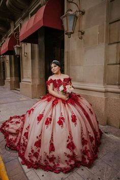 Details: Silhouette: Ball Gown Style Fabric: Tulle Fabric Color: Red Color Length: Chapel Train Neckline: Off the Shoulder Neck Sleeves: Sleeveless Back: Corset Back Embellishment: Appliqued Queincearra Dresses Red, Red And Cream Quince Dress, Red Floral Quince Dress, Red White Quinceanera Dresses, Red And Champagne Quinceanera Dress, Red And Pink Quinceanera Dresses, Quince Dresses Red And White, Queen Of Hearts Quinceanera Dress, Light Red Quinceanera Dresses