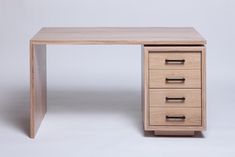 a wooden desk with three drawers on each side and one drawer at the top that is open