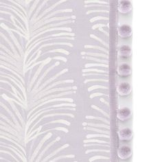 a purple and white wallpaper with pom - poms on the bottom corner