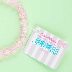 Complete your kawaii outfit with this super cute bracelet! It’s made from clear pink plastic beads, two heart-shaped beads, and a Hello Kitty charm. Total length: 17 cm Hello Kitty Bead Bracelet, Kawaii Bracelet, Purple Beads, Plain Outfits, Pink Plastic, Kawaii Shop, Cute Bracelets, Two Hearts, Kawaii Clothes