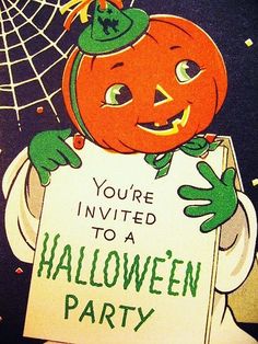 a halloween party with a pumpkin holding a sign