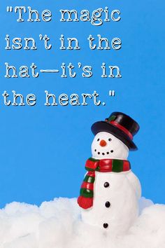 a snowman with a top hat and scarf