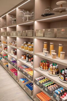 the shelves are full of food and condiments