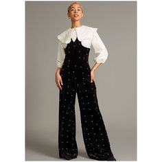 Command The Room In This Chic Velvet Jumpsuit Adorned With White Pearls. Fitted Bodice And Wide Leg. Achieve Different Looks By Wearing It Alone Or Layered With A Shirt. V Front And Back Sleeveless Side Slant Pockets Wide Leg 100% Polyester Back-Zip Fastening Dry Clean Imported Dimensions 59" L Chic Fitted Jumpsuits And Rompers With Bib Front, Striped Palazzo Pants, Button Pants, Velvet Jumpsuit, Multi Colored Flowers, Sequin Pants, Halter Jumpsuit, Wide Leg Linen Pants, Wide Stripes