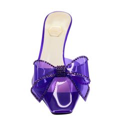 Dimante purple shoes is perfect for every occasion. From the Eureka Collection, Nalebe's mules flaunt a PVC construction adorned with a glamorous crystal-embellished bow. Made in Italy, this pair is anchored by a sleek stiletto heel. Glitter upper Square pointed toe Slip-on style Lining: Leather Leather sole Made in Italy You can't beat the beauty and vibrancy of the Dimante Mule SIZE & FIT • Runs True To Size. Take your normal size PRODUCT DETAILS Nalebe's Dimante mules are crafted of PVC with Trendy Footwear, Purple Shoes, Stiletto Heel, Mule, Stiletto Heels, Slip On, Sleek, Glitter, Italy