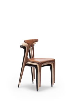 two chairs made out of wood, one with a bent back and the other without