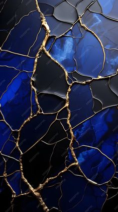 an abstract blue and gold marble background with metallic foil on the edges, in shades of black