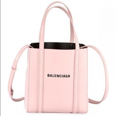 Balenciaga Pink Everyday Xxs Tote Bag. Smooth Double Calfskin, Adjustable And Removable Crossbosy Straps And Front Printed Logo. Dimensions W19.0 Cm X H22.0 Cm X D9.5 Cm! Designer Box Bag For Errands, Designer Pink Box Bag For Daily Use, Pink Designer Box Bag For Shopping, Designer Pink Everyday Bag, Designer Pink Bag For Everyday, Designer Pink Bags For Everyday Use, Pink Leather Box Bag With Dust Bag, Luxury Pink Everyday Bags, Luxury Pink Bag For Everyday