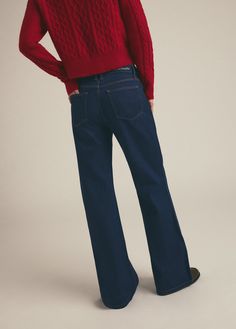 A new flare favorite debuts for fall. The Olympia Flare is a low slung style that's relaxed at the hips and thigh with a flare hem that sweeps the floor. Wide slant pockets and triple needle top-stitch give this rigid indigo denim an elevated look. (Favorite Daughter embroidery on the back waistband, of course.)76% Cotton, 24% Lyocell Rise / Waist: low rise Hips: relaxed at hips Leg: relaxed at thigh Average Height: full length (bunches at hem) 10.25" rise 18.5” knee 22" leg opening 33" inseam M Sweep The Floor, Average Height, Indigo Denim, Favorite Daughter, The Floor, Olympia, Low Rise, Manchester, Full Length