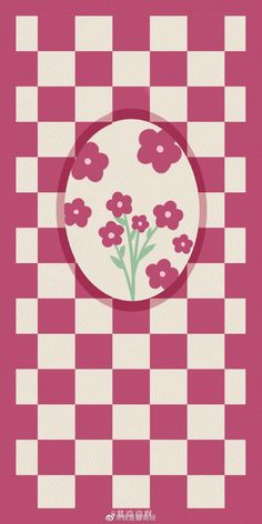 a pink and white checkered table cloth with flowers in the center on top of it