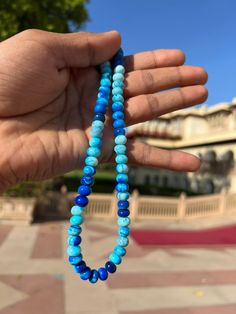 Natural Shade Blue  Round Shape Smooth Opal Beads Necklace ,7-10 mm Opal Beads, 16 Inch Strands Necklace AAA+ Quality. Gemstone  :    Opal. Color           :    Shade Blue. Size             :     7-10 mm size. Shape         :    Round Smooth Shape. Style           :    Smooth Handmade Beads.  Quality       :    AAA+ Length       :    16''  Strand.  For   :   Necklace, Jewelry Design, Craft Making, Gift, Etc.   These Are Natural Gemstones Therefore, Variation In The Shade & Quality Is Expected. Gemstone Picture Shown Are Of Actual Gemstone That You Will Receive, However, The Color & Appearance May Look Slightly Different Depending On Your Monitor Resolution & Climatic Condition. Some Imperfections Can Be Expected As Stones Are Natural. If Required, Please Ask Us To Show The Lot Image Before Blue Oval Beaded Beads, Blue Gemstone Beads For Gifts, Blue Polished Beaded Bracelets For Healing, Blue Rondelle Beaded Bracelets With Polished Beads, Blue Oval Gemstone Beads, Hand-strung Turquoise Beaded Necklaces With Round Beads, Hand-strung Blue Beaded Bracelets With Round Beads, Hand-strung Blue Beaded Bracelets, Traditional Blue Polished Beaded Bracelets