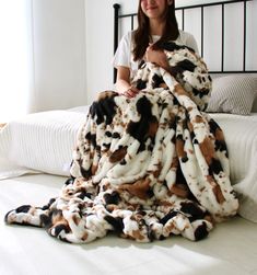 Cow print blanket, faux fur blanket, cow print minky blanket, snuggly blanket, soft blanket  LUX DESIGNER BLANKETS- Black and Brown Cow Print  This adult size ruched blanket is hand sewn. It is made by the softest fabric we have. We sourced a specific fabric for those that do not want any compromise the soft feel of minky/faux fur and also want a heavy weight blanket. This blanket is what we call "the incredible hug" because of the elastic feature it has truly feels like a wrapped up hug. It's a Cow Print Blanket, Western Bedroom Decor, Western Rooms, Western Bedroom, Faux Fur Throw Blanket, Luxury Throws, Faux Fur Blanket, Fur Throw Blanket, Blanket Black