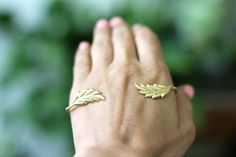 This beautiful leaf palm bracelet is perfect for a special occasion or just to add a hint of fairy dust to an everyday look. The metal base is flexible and good be somewhat adjusted to achieve the best fit. * Comes wrapped in a pretty organza gift bag.* Could be requested in 14k gold, rose gold or silver plated brass.For updates, new products, one-of-a-kind's, special offers and more- like us on Facebook:https://www.facebook.com/avigailadamjewelleryFollow me on Instagram: https://instagram.com/a Palm Cuff, Palm Bracelet, Bracelet Aesthetic, Ethereal Jewelry, Boho Chic Accessories, Gold Arm Band, Unique Bridal Jewelry, Hand Palm, Golden Leaf