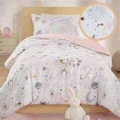 Get ready for adorable and enchanting dreams with the Mi Zone Kids Celia Starry Sky Metallic Printed Comforter Set. The comforter is a girl's dream, with gold metallic stars and moons that sparkle on the soft fabric, creating a magical look. The set includes two matching shams (one in Twin/Twin XL) that have the same starry pattern, and a cute round decorative pillow with embroidered details. So cozy and cute! Items in the set may come in a rolled or compressed packaging, which will need to be fluffed up or steam ironed before use to remove wrinkles. Color: Pink. Space Comforter, Girls Comforter Sets, Round Decorative Pillows, Girl Comforters, Full Comforter Sets, Queen Size Comforter Sets, Stars And Moons, Queen Size Comforter, Twin Comforter Sets