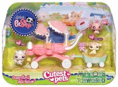 littlest pet shop playset with baby carriage and puppies in its packaging box