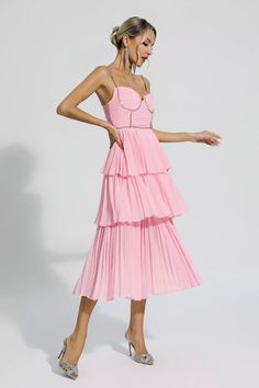 The Meredith Pink Diamond Ruched Midi Dress is sure to wow the crowd at your next special event! Cut from high-quality pleated fabric, diamond-embellished suspenders, meticulous tailoring, bringing charming details. The high-waisted design and loose skirt easily flatter your figure. Pair it with high heels for a party-ready look.  Dress Length: Approx 117cm Materials: Polyester Gentle Dry Clean Only  The model is 5 ft 7 and wears size S  Color may vary due to lighting on images. The product imag Elegant Midi Dress With Smocked Bodice And Ruffled Straps, Pleated Party Dress With Ruffled Straps, Pleated Dress With Ruffled Straps For Party, Party Midi Dress With Smocked Bodice And Sweetheart Neckline, Party Midi Dress With Pleated Bodice And Spaghetti Straps, Elegant Tiered Ruched Midi Dress, Ruched Midi Dress With Ruffled Straps For Party, Party Midi Dress With Ruched Ruffled Straps, Ruched Tiered Dresses For Gala