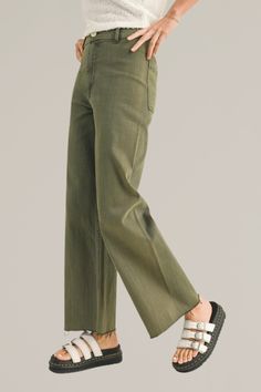 upgrade your casual wardrobe with these olive wide-leg cut-off denim pants, a versatile blend of comfort and contemporary style. crafted from premium denim with stretch, these pants feature a flattering high-rise waist and a wide-leg silhouette that offers a relaxed, yet chic look. the olive hue adds a touch of sophistication and pairs effortlessly with both casual tees and dressier tops. finished with a cut-off hem for a modern edge, these pants are ideal for creating effortless day-to-night ou Casual Tees, Dressy Tops, Romper With Skirt, Casual Tee, Premium Denim, Night Outfits, Dress Romper, Casual Wardrobe, Hat Hairstyles