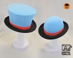 two hats are sitting on top of each other, one blue and the other red