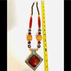 Shop Women's himalayan necklace Red Orange Size OS Necklaces at a discounted price at Poshmark. Description: These beautiful Himalayan necklaces having unique design long necklace will be a perfect touch to your outfit n clothes.. Sold by tadolma. Fast delivery, full service customer support. Red Bohemian Necklace With Large Pendant, Red Large Pendant Jewelry For Festival, Red Jewelry With Large Pendant For Festivals, Handmade Orange Long Necklace, Handmade Orange Necklace, Orange Bohemian Necklace, Bohemian Orange Long Necklace, One-of-a-kind Red Necklace For Festival, One Of A Kind Red Necklace For Festival