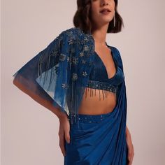 This Designer Piece Was Custom Made Wore It Once In A Reception Party For 2 Hrs It Is Padded Blouse . It Is Size Medium Which Is 34-36. Super Comfortable And Elegant Piece . Festive Blue Pre-draped Saree For Evening, Blue Hand Embellished Pre-draped Saree For Festive Occasions, Fitted Blue Pre-draped Saree For Festive Occasions, Blue Fitted Pre-draped Saree For Reception, Elegant Blue Pre-draped Saree For Festive Occasions, Traditional V-neck Pre-draped Saree For Parties, Traditional Blue Blouse Piece For Evening, Blue Pre-draped Saree With Unstitched Blouse For Reception, Blue Traditional Drape Blouse For Evening