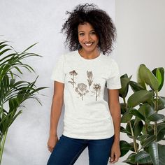 Our graphic tees are very soft and trendy. They are long enough to wear with a pair of leggings, soft enough to roll the sleeves and if you want to add some flair, just tie it up in a knot. However you decide to wear it, you'll love the fit and comfort of this tee. ► SHIRT DETAILS The shirt brand is Bella and Canvas and are UNISEX - they are meant to have a loose fit so if you would like it to be more tight, it is recommended to order a size down. *The tees are made Direct to Garment (DTG): how Barcelona Skyline, Prince Gumball, Boho Moon, Long Torso, Boho Designs, Yoga Shirts, Prism Color, Comfy Tees, Daisy Flower