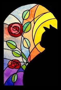 a black cat sitting in front of a stained glass window with roses and leaves on it