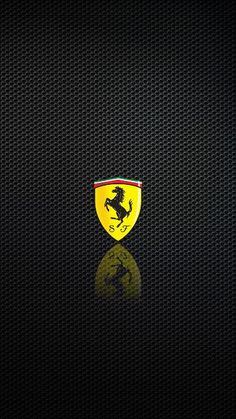 the ferrari logo on a black background