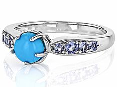 6mm Round Cabochon Sleeping Beauty Turquoise With 0.27ctw Round Tanzanite Rhodium Over Sterling Silver Ring. Measures Approximately Turquoise Multi-stone Round Gemstones, Turquoise Multi-stone Gemstones, Turquoise Jewelry With Center Stone, Anniversary Turquoise Ring With Gemstone Accents, Yellow Watches, School Jewelry, Popular Jewelry, Sleeping Beauty Turquoise, Turquoise Jewelry