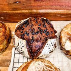 baked goods displayed on cooling rack in bakery setting