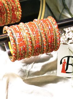 Traditional Indian Red Chooda Bangles in USA Cheap Red Bangle For Wedding, Traditional Beaded Bangle For Wedding, Traditional Wedding Beaded Bangle, Red Bollywood Bracelet Gift, Beaded Bangle For Wedding And Festive Occasions, Festive Beaded Bangle For Festivals, Festive Beaded Wedding Bangle, Festive Wedding Beaded Bangle, Traditional Bracelets With Zari Work For Celebration